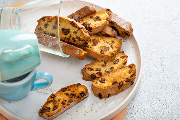 Close up of sweet cantuccini almond biscuits on plate copy space