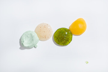 Top view of cosmetic cream gel clay swatches