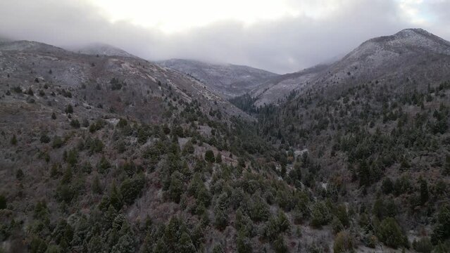 Aerial view of the snowy rural mountainous areas of Hobble Creek Canyon, Springville Utah