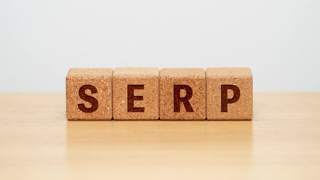 SERP / four wooden blocks with the letters SERP on the wooden surface	