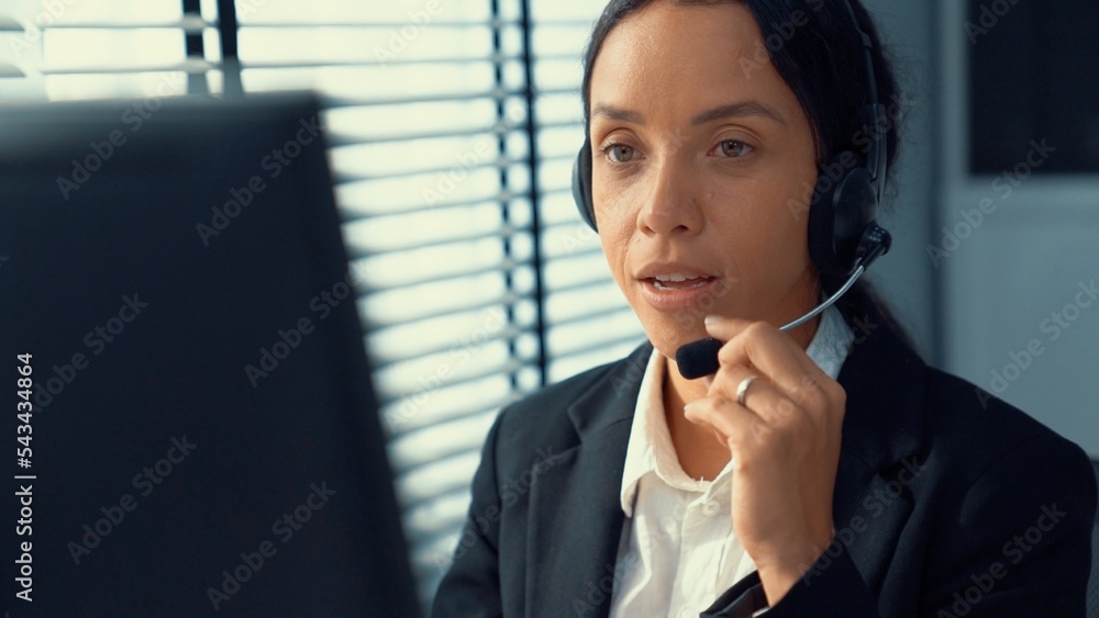Aufkleber competent female operator working on computer and talking with clients. concept relevant to both cal