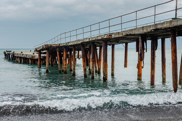 Old broken down pier in Alushta. Crimea