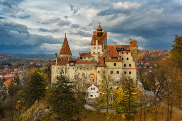 Bran castle in Transylvania and dark clouds