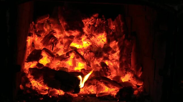 Fire in the fireplace at night in nature
