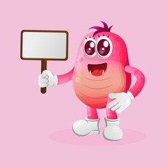 Cute pink monster holding billboards