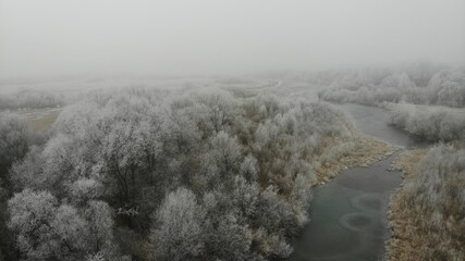 Obraz na płótnie Canvas created by dji camera, flight over foggy forest and river
