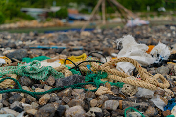 Garbage on the seashore.  The photo was taken in cloudy weather in Vietnam. 