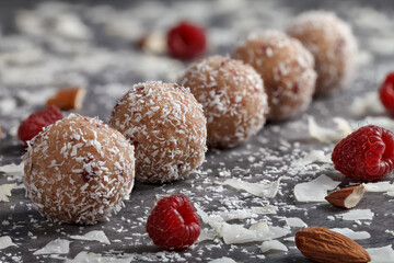 Homemade truffles. Round sweets. Truffle a almonds. Coconut shavings