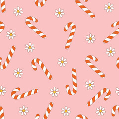 Christmas retro seamless pattern with groovy candy cane and cute flowers. Vintage vector for winter holidays postcard, invitation, wrapping paper, packaging etc.