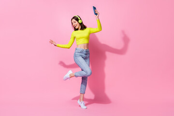 Full size photo of positive lady clubber use modern device make picture selfie video enjoy empty space isolated on pink color background
