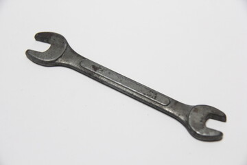 wrench to unscrew nuts or bolts.