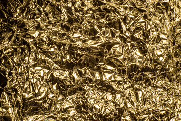 crumped golden aluminum foil texture	