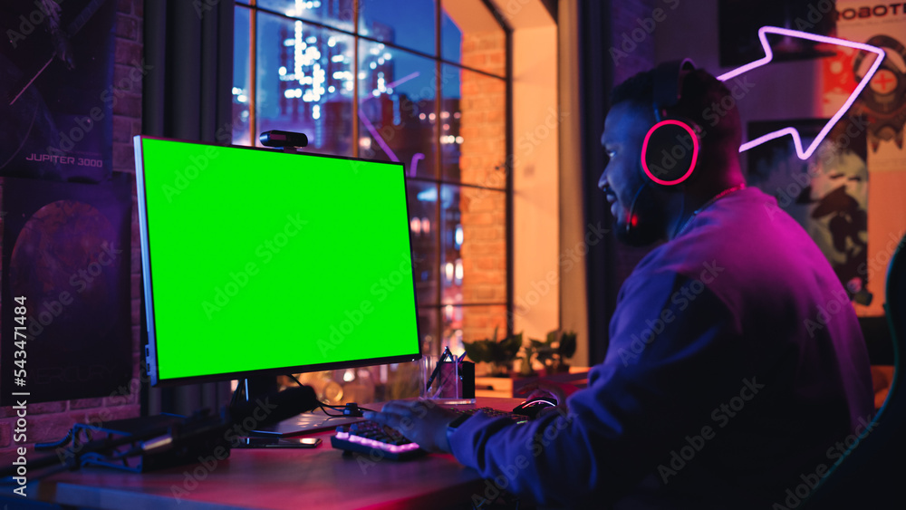 Poster gaming from home: black gamer playing online video game on powerful personal computer. stylish male 