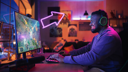 Fototapeta na wymiar Gaming From Home: Black Gamer Playing Online Video Game on Powerful Personal Computer. Stylish Male Player Enjoying RPG Strategy with Screen Showing Arcade Online Multiplayer PvP Battle.