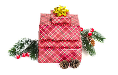 Gift boxes with Christmas gifts wrapped in red checkered paper with bows on a white background