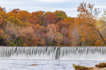 Overcast view of the fall color of Grand Falls