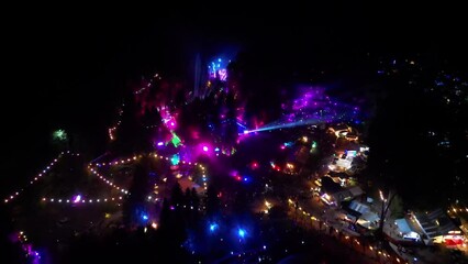 Aerial Drone footage of outdoor electronic music festival at night