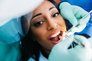 Portrait of an African patient at the dentist.