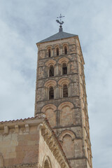 Fototapeta na wymiar Romanesque tower of the church of San Esteban silhouetted against the sky in Segovia. Spain