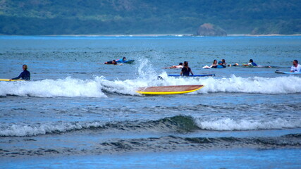 Surfers in Tamarindo, Costa Rica