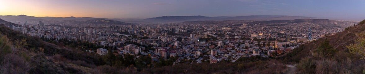 panoramic scenic top view of tbilisi at dusk