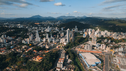 aerial image of Blumenau city, Santa Catarina, southern Brazil, buildings, main streets, vegetation and sunny day