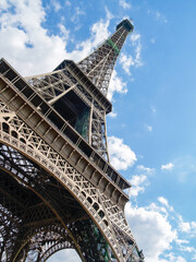 Eiffel Tower reaching to blue sky