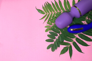 Sex toys. Blue and purple vibrators on a pink background. Useful for adult, sex shop - obrazy, fototapety, plakaty