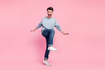 Fototapeta na wymiar Full length photo of young handsome funny man student celebrating test done dancing winner crazy isolated on pink color background