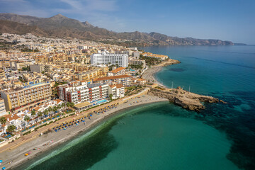 The drone aerial view of Nerja, Andalusia, Spain. Nerja is a municipality on the Costa del Sol in the province of Málaga in the autonomous community of Andalusia in southern Spain.