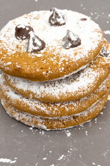 closeup of stack of cookies isolated on grey