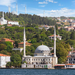View from Bosphorus Strait overlooking Beylerbeyi Mosque, or Beylerbeyi Camii, aka Hamid i-Evvel Mosque, suited at the waterside of Beylerbeyi district, Istanbul, Turkey
