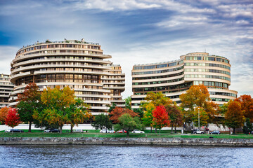 The Watergate Hotel complex from the Potomac River in Washington, DC in autumn - 543492278