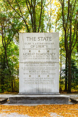 Granite stone tablet measuring 21-feet tall inscribed with quote from President Theodore Roosevelt...