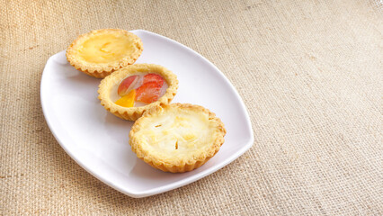 Three homemade pies on banana leaf. Traditional Indonesian desserts. Selective focus