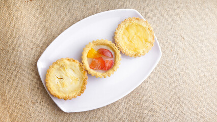 Various flavors of pie. Flat lay of homade Pie susu. Pie susu or milk pie is one of the popular snacks from Bali, Indonesia.