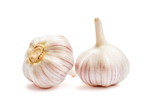 Two garlic bulbs isolated on white background