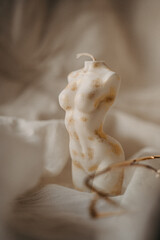 A candle burned on the table