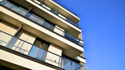 New apartment building on a sunny day. Modern residential architecture. The apartment is waiting for new residents.
