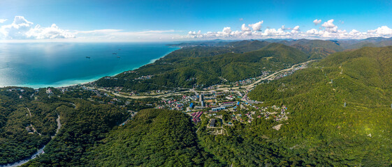 Naklejka na ściany i meble over the village of Shepsi near the Black Sea coast (South of Russia) - aerial panorama view on a sunny summer day