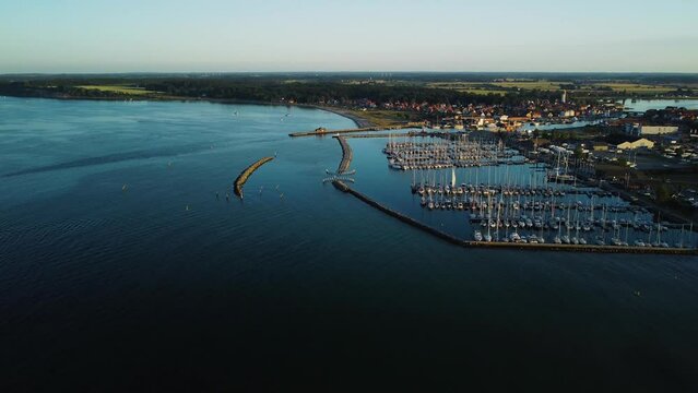 Aerial shot of a marina full of boats during the day in Kerteminde, Denmark