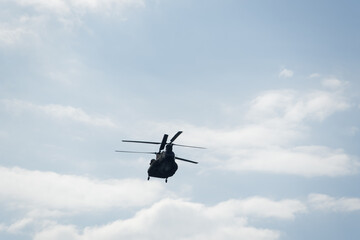 Boeing CH-47 Chinook during an air show. Greek Air Force twin-engine lift helicopter flying on...