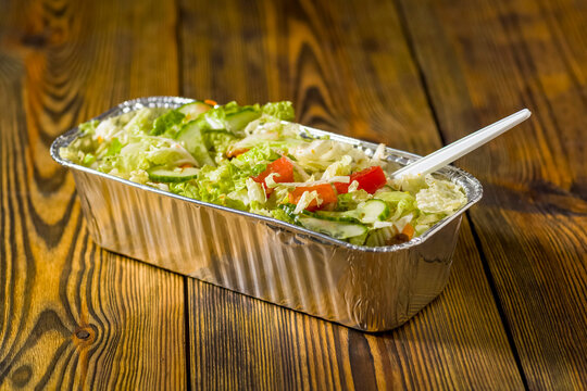 fries baked with meat, cheese and vegetables