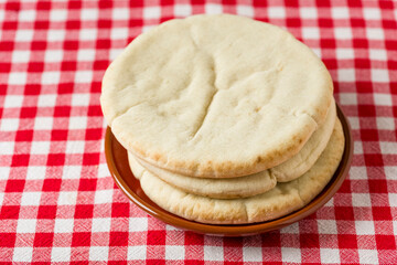 a few pita breads on the plate -