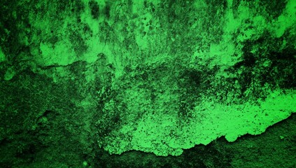 A textured green grunge background with dark patches and rough surface