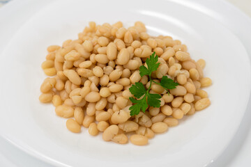 boiled white beans in the plate