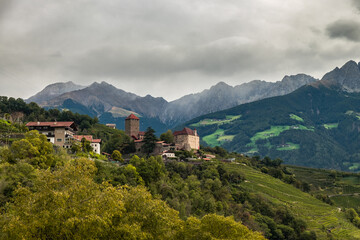 Medieval Castle in the Alps on a moody cloudy day