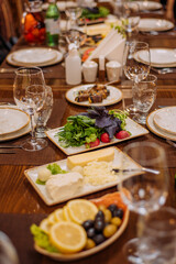 Laid table in the restaurant. Beautiful serving. Reserved table in the restaurant.