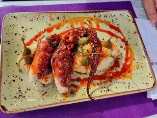 Grilled octopus with potato pure. Galician octopus