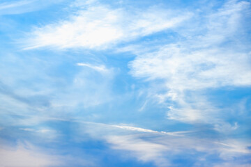 Blue sky with white clouds. Beautiful cloudy sky. Skyward. Endless skyline. The sky at dawn.